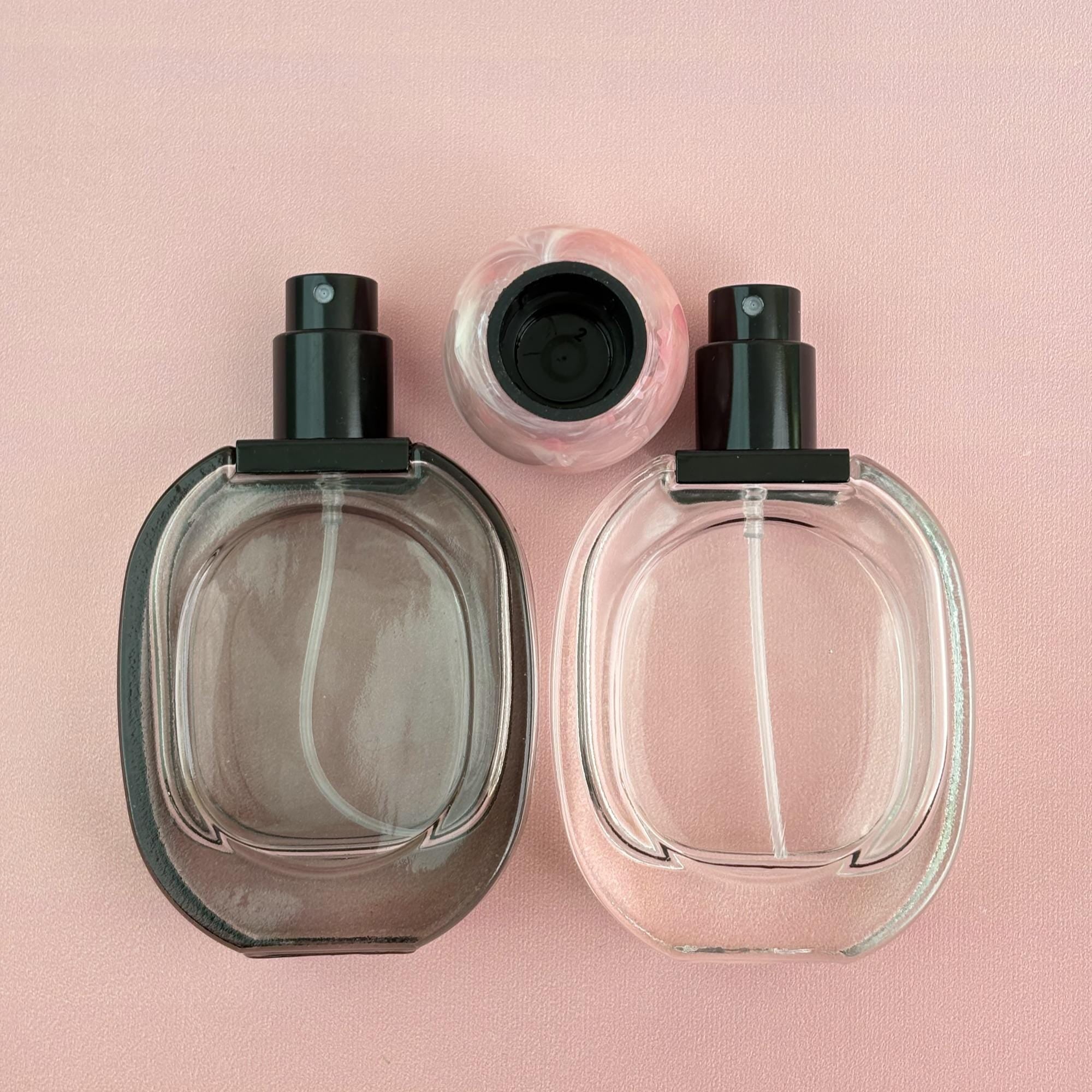 Glass Spray Bottle with Pink plastic Ball Caps