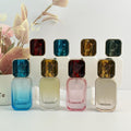 Faceted Gem-Cap Square Glass Spray Bottles