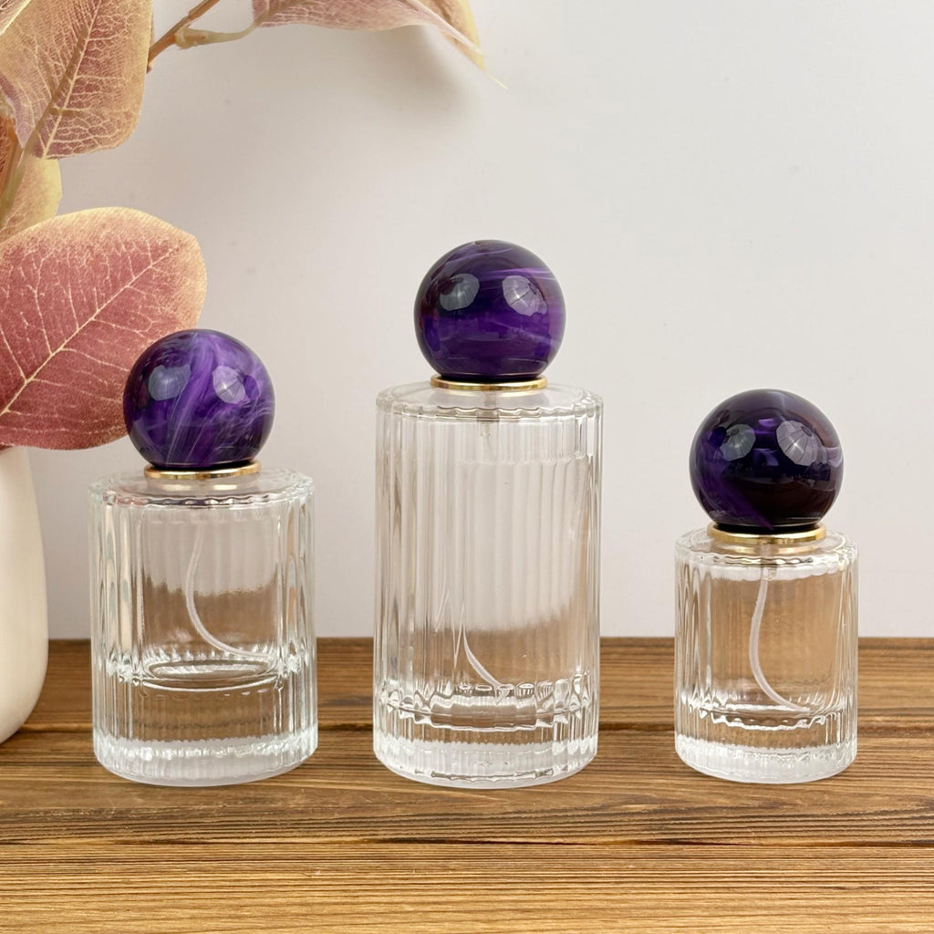 Clear Ribbed Glass Spray Bottle with Purple Ball Cap