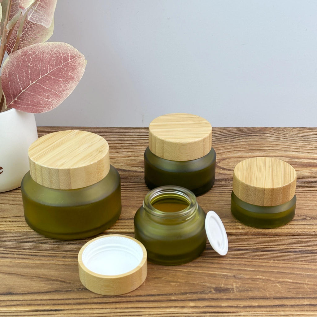 Green Glass Cosmetic Bottles and Jars