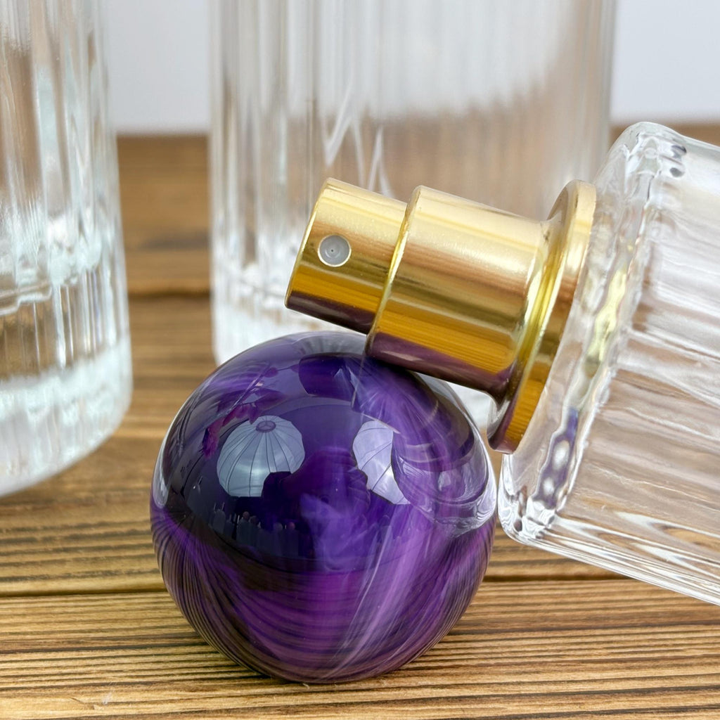 Clear Ribbed Glass Spray Bottle with Purple Ball Cap