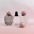 Glass Spray Bottle with Pink plastic Ball Caps