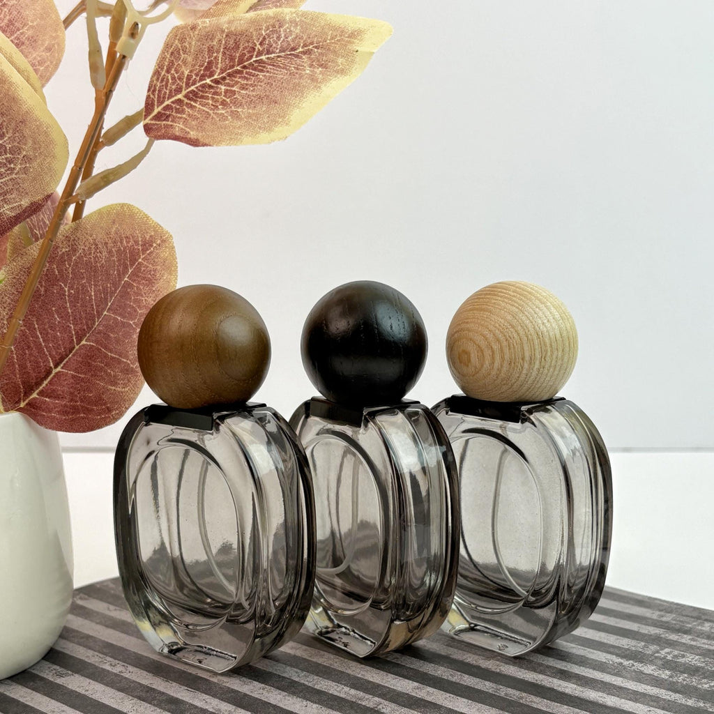 Empty Clear Black Glass Spray Bottles with Wooden Caps