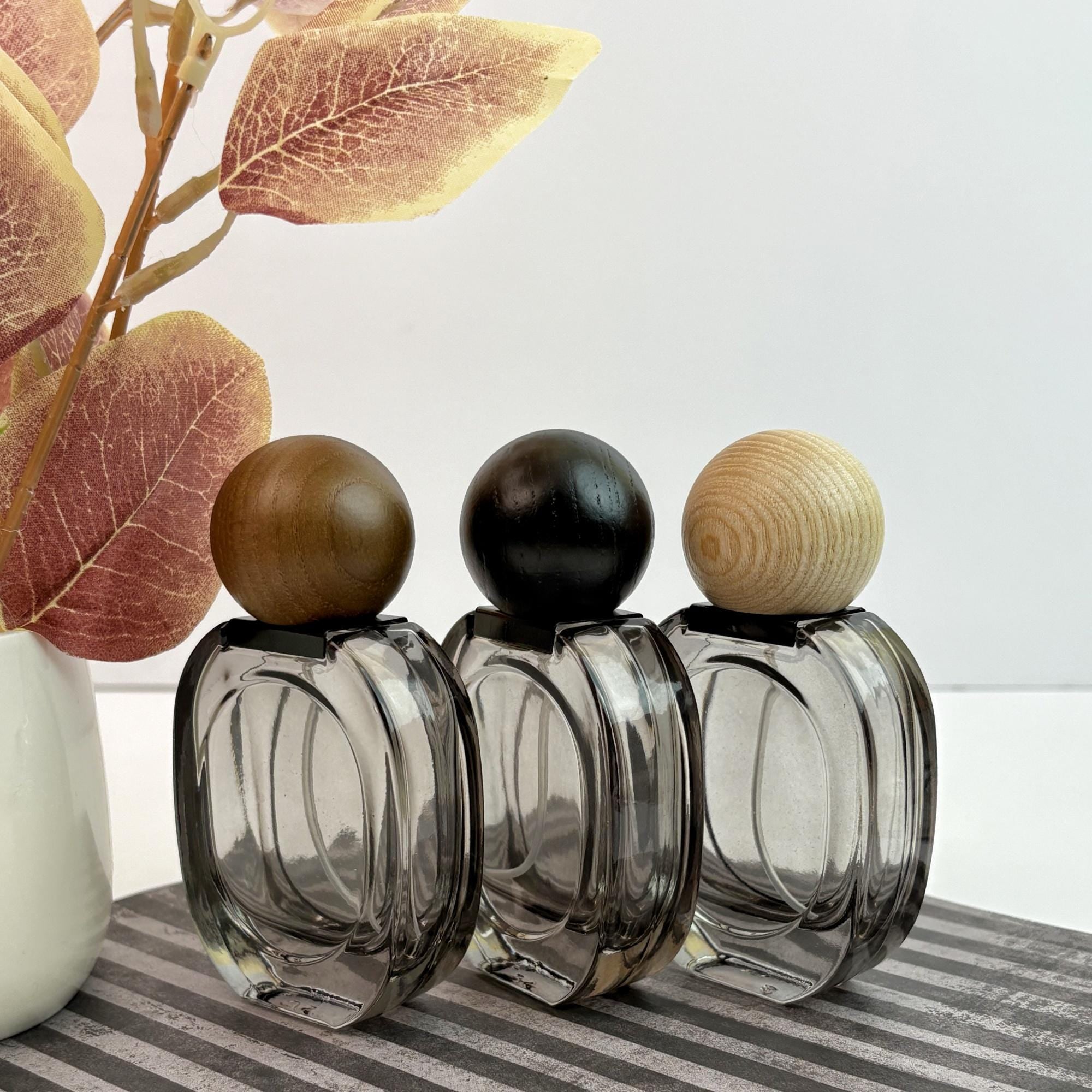 Empty Clear Black Glass Spray Bottles with Wooden Caps