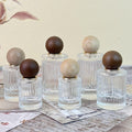 Minimalist Clear Striped Glass Spray Bottle with Wooden Ball Lid