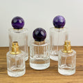 Clear Ribbed Glass Spray Bottle with Purple Ball Cap