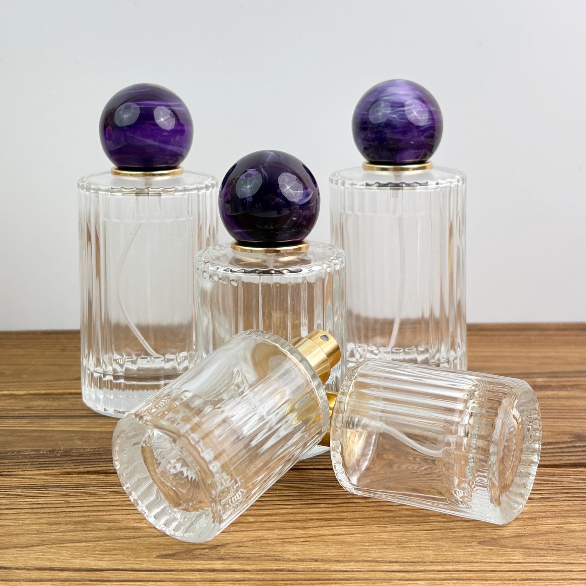 Clear Ribbed Glass Spray Bottle with Purple Ball Cap