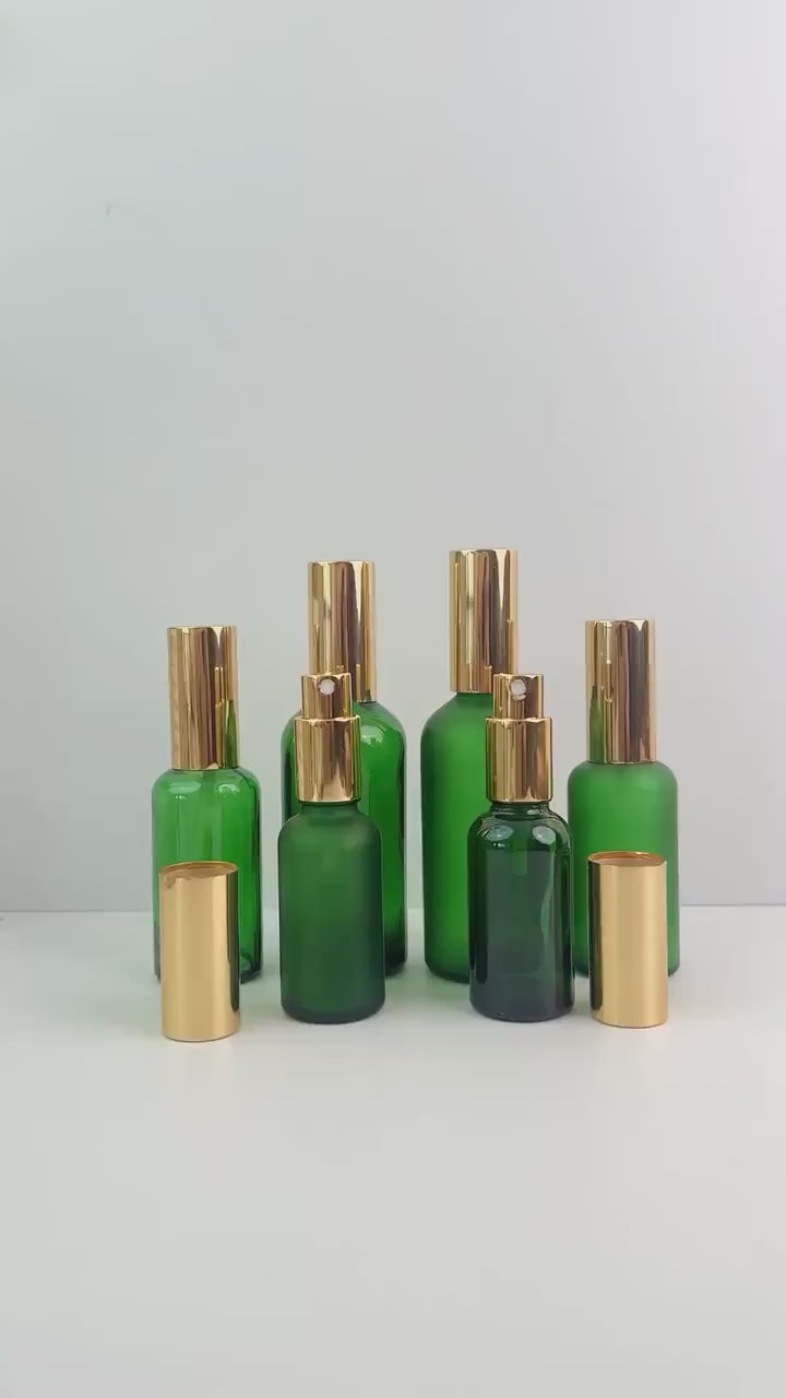 Green Glass Spray Bottles
